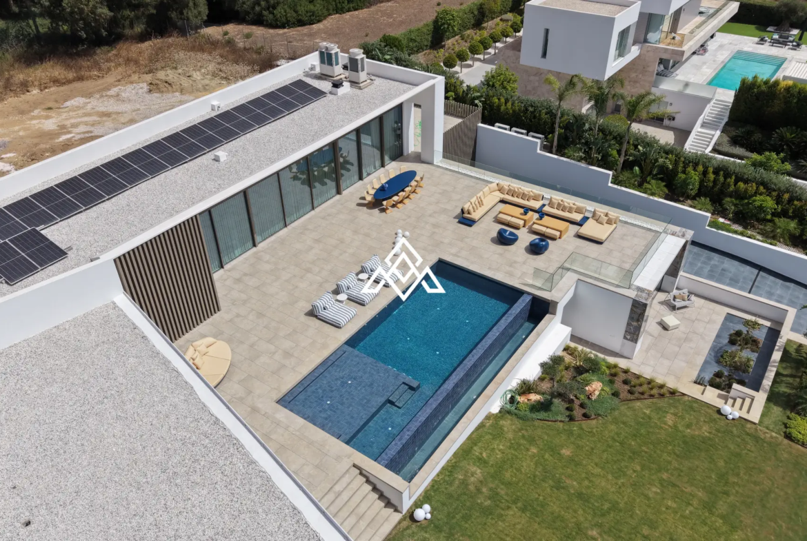 Luxury La Reserva villa for sale in Sotogrande with panoramic sea views and indoor swimming pool.