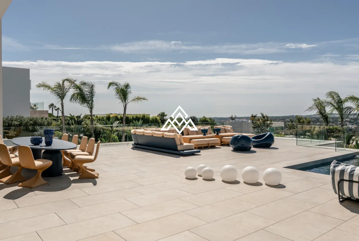 Luxury La Reserva villa for sale in Sotogrande with panoramic sea views and indoor swimming pool.