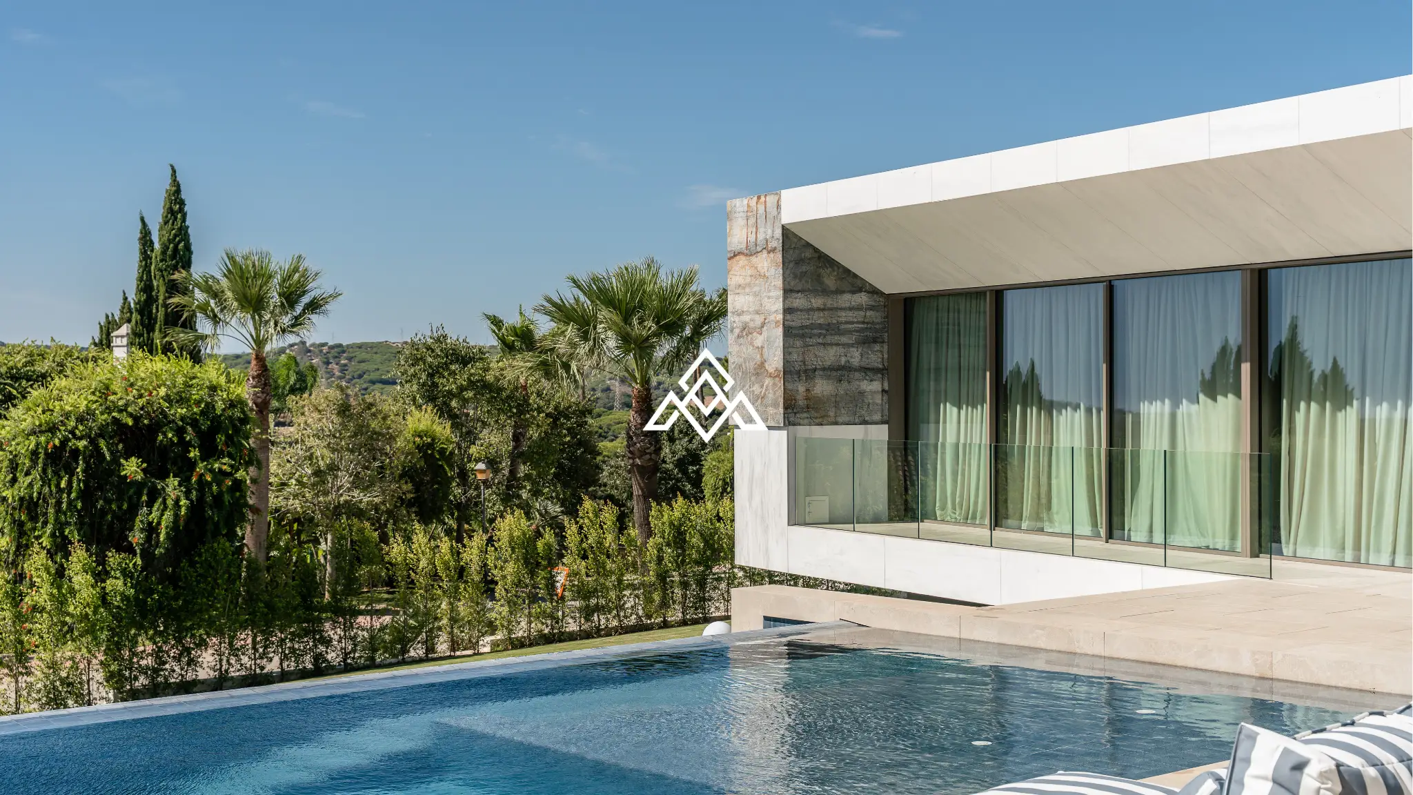 Luxury La Reserva villa for sale in Sotogrande with panoramic sea views and indoor swimming pool.
