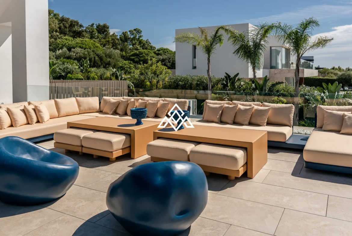 Luxury La Reserva villa for sale in Sotogrande with panoramic sea views and indoor swimming pool.