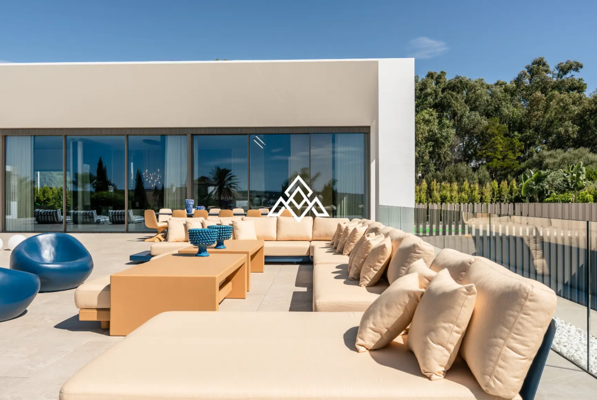 Luxury La Reserva villa for sale in Sotogrande with panoramic sea views and indoor swimming pool.
