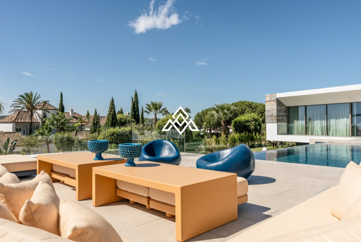 Luxury La Reserva villa for sale in Sotogrande with panoramic sea views and indoor swimming pool.