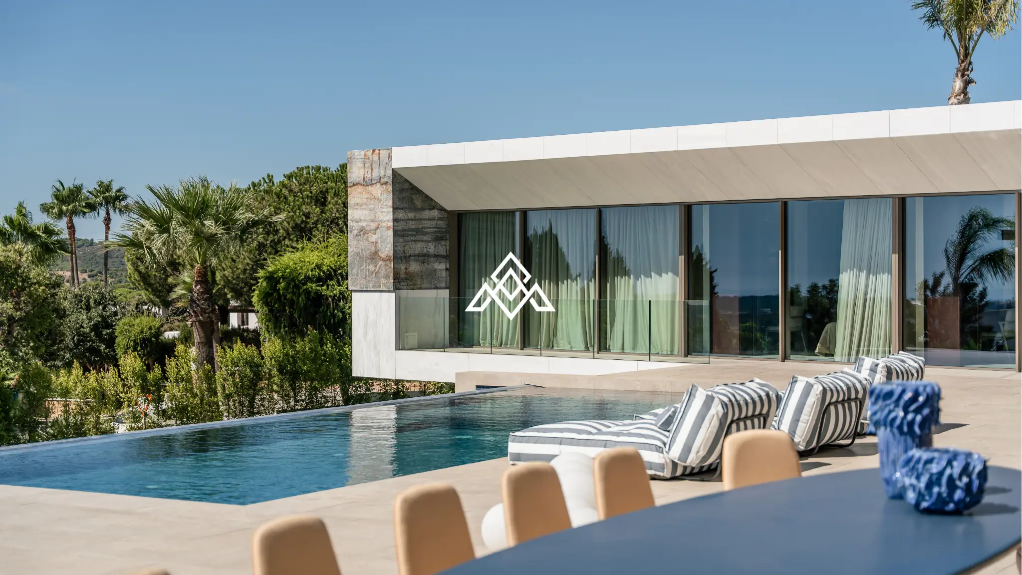 Luxury La Reserva villa for sale in Sotogrande with panoramic sea views and indoor swimming pool.