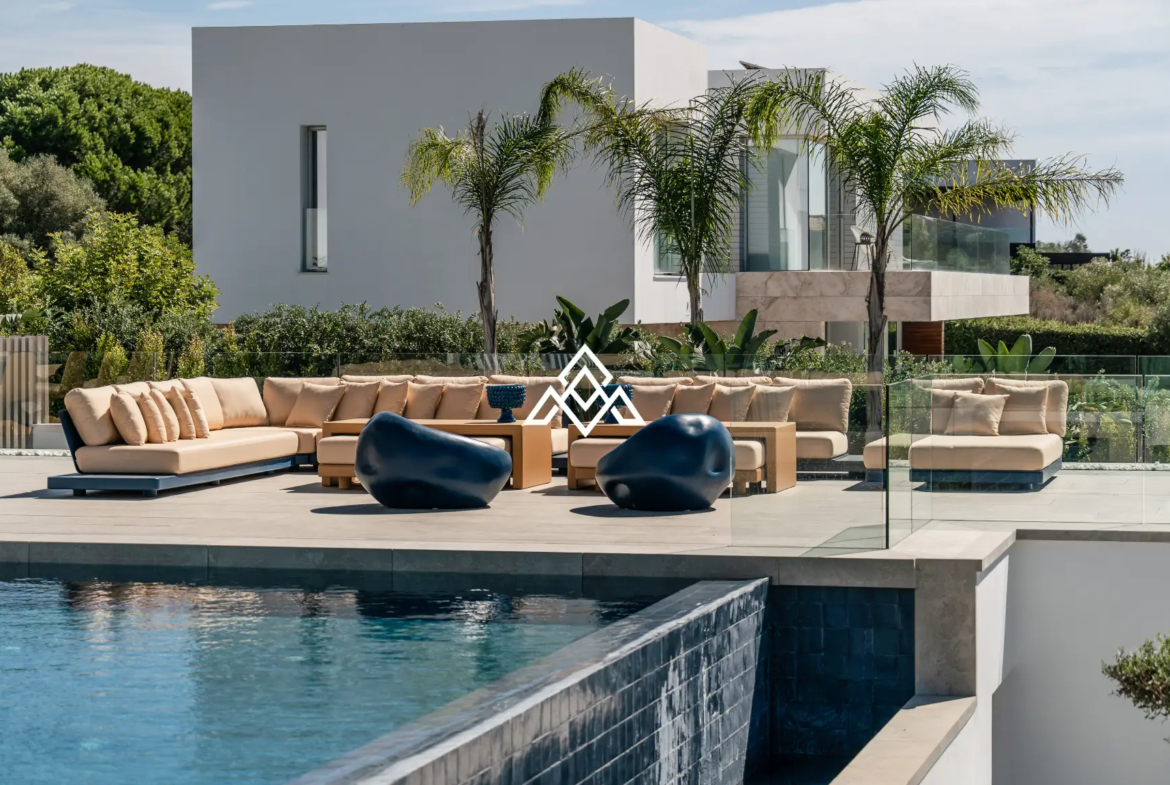 Luxury La Reserva villa for sale in Sotogrande with panoramic sea views and indoor swimming pool.