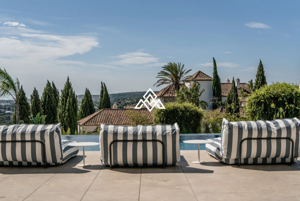 Luxury La Reserva villa for sale in Sotogrande with panoramic sea views and indoor swimming pool.