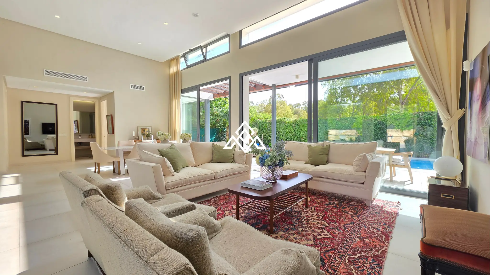 Contemporary Villa in Estepona with tourist licence, 4 bedrooms, private terraces and high rental income potential in a secure gated community.