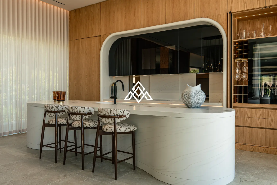 Luxury La Reserva villa for sale in Sotogrande with panoramic sea views and indoor swimming pool.