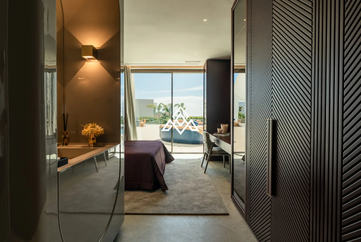 Luxury La Reserva villa for sale in Sotogrande with panoramic sea views and indoor swimming pool.