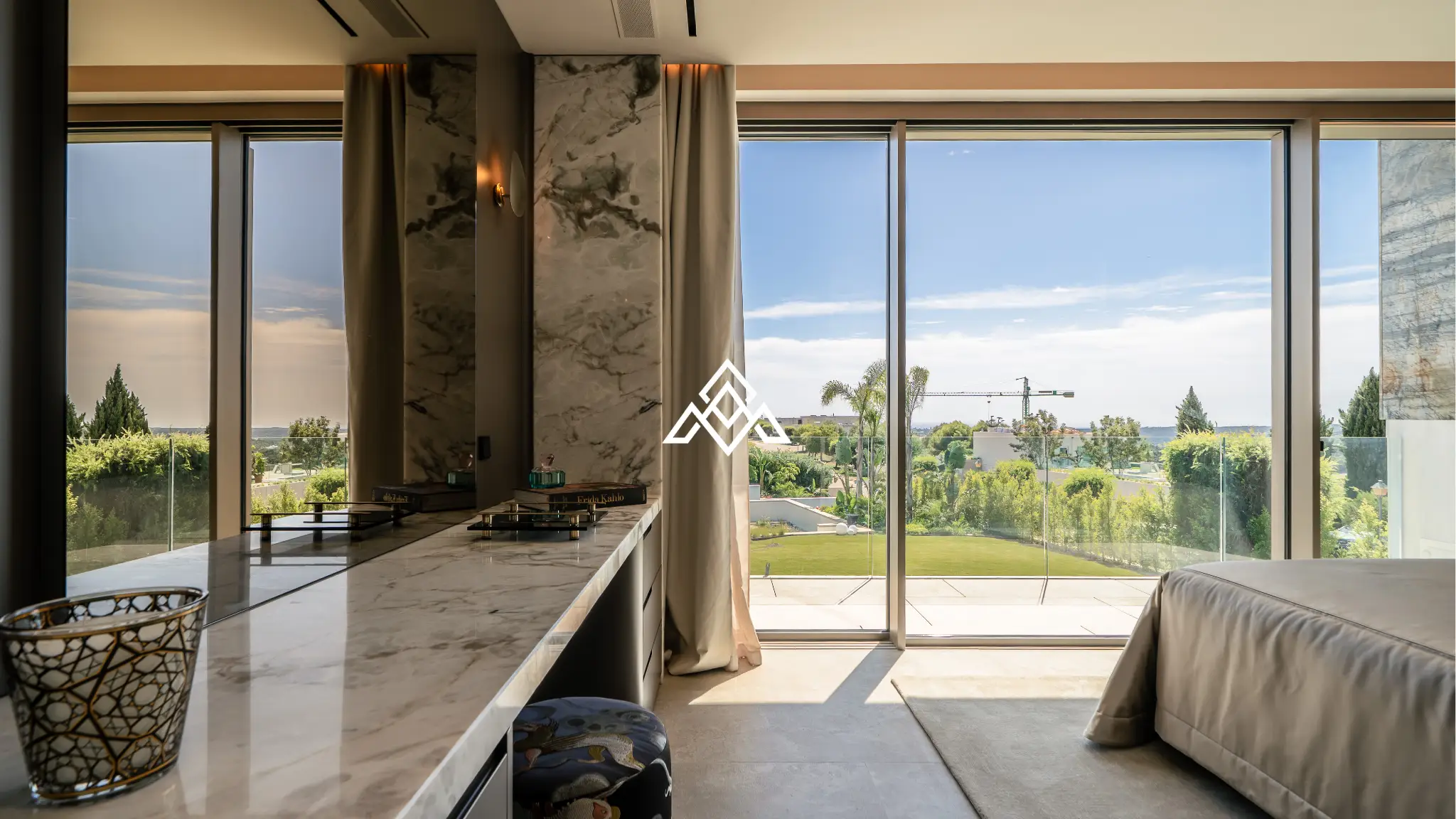 Luxury La Reserva villa for sale in Sotogrande with panoramic sea views and indoor swimming pool.
