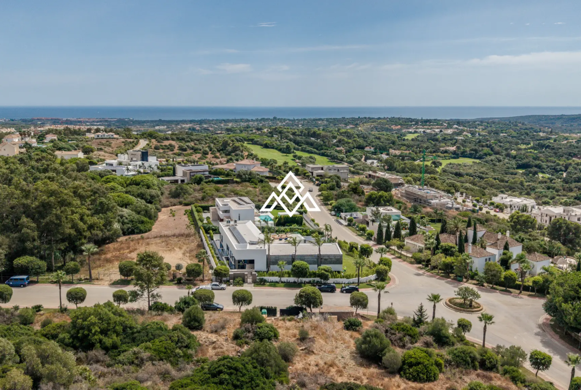 Luxury La Reserva villa for sale in Sotogrande with panoramic sea views and indoor swimming pool.
