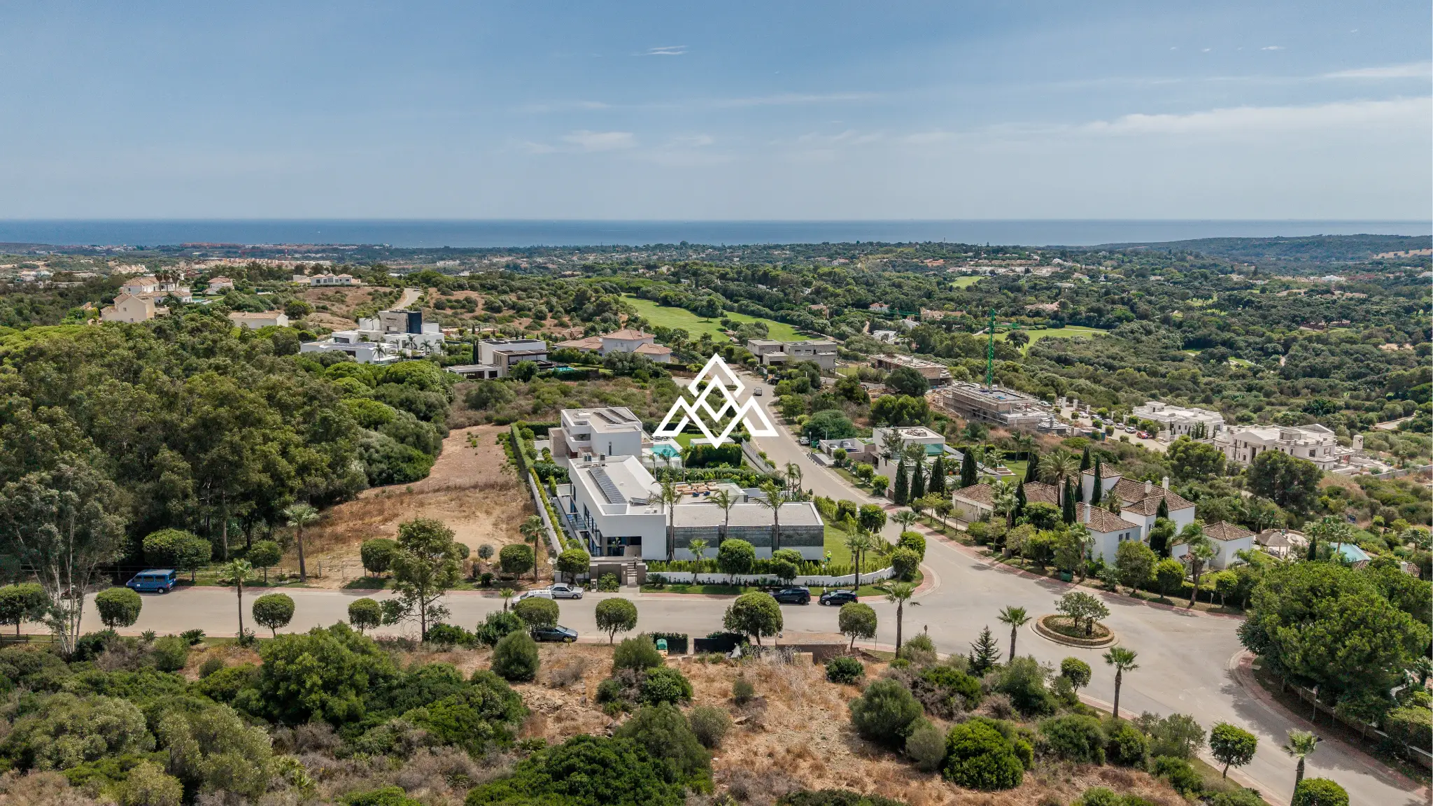 Luxury La Reserva villa for sale in Sotogrande with panoramic sea views and indoor swimming pool.
