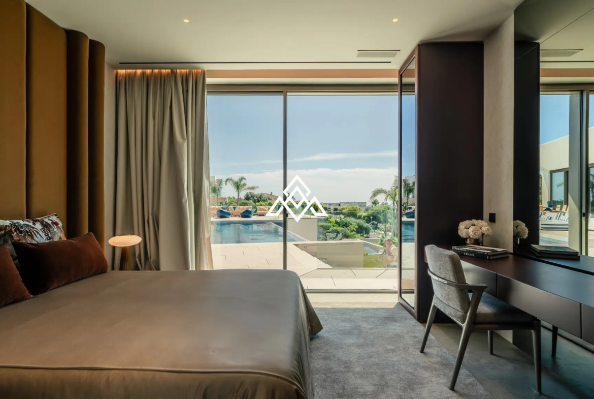 Luxury La Reserva villa for sale in Sotogrande with panoramic sea views and indoor swimming pool.