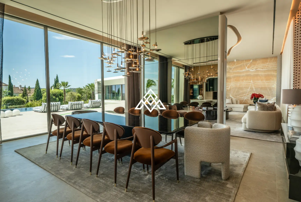 Luxury La Reserva villa for sale in Sotogrande with panoramic sea views and indoor swimming pool.