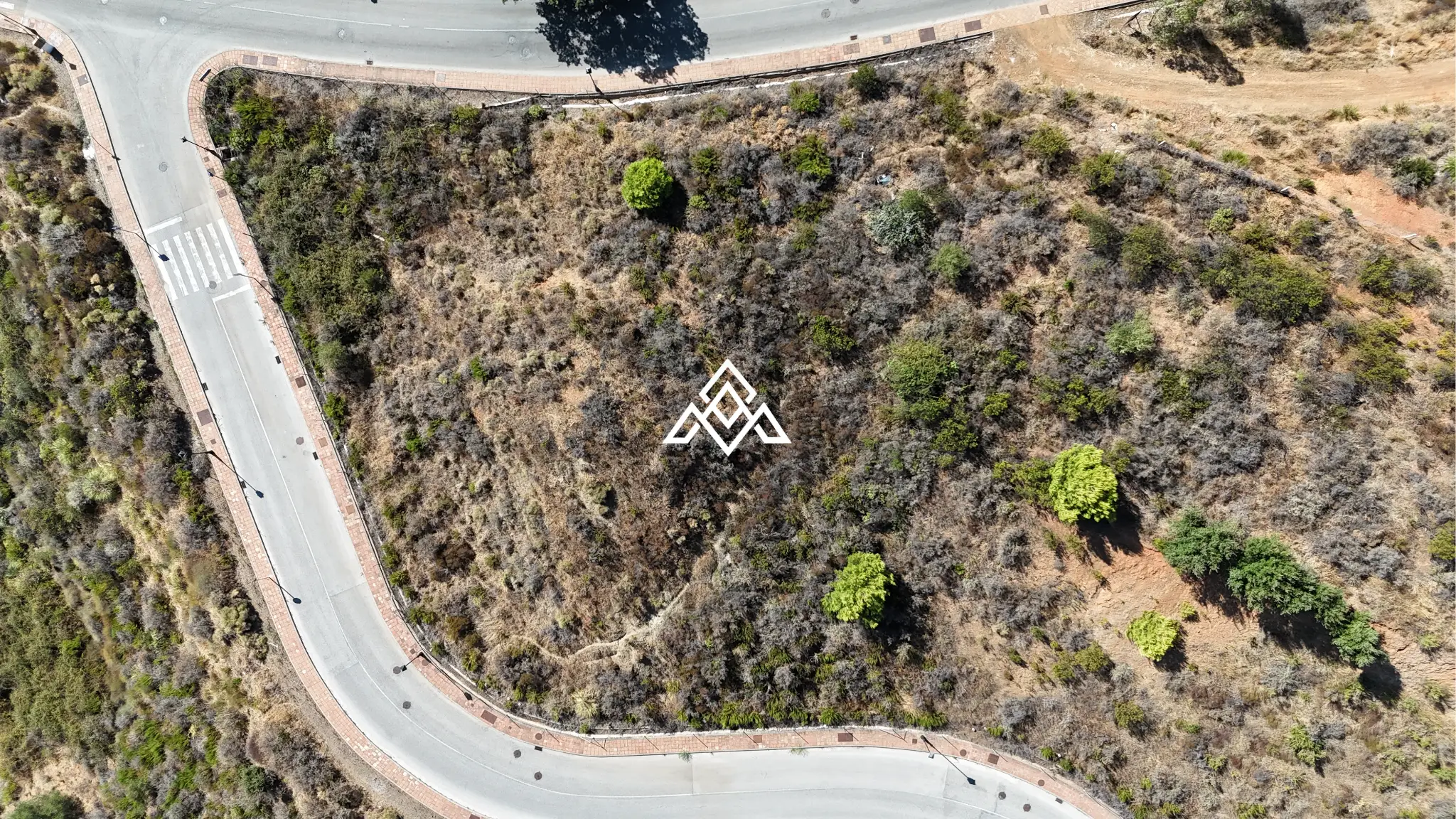 MPA-0125 La Cala Golf plot for sale in Mijas Costa, featuring 1,733 m² of land, panoramic sea and golf views, and a unique architectural project.