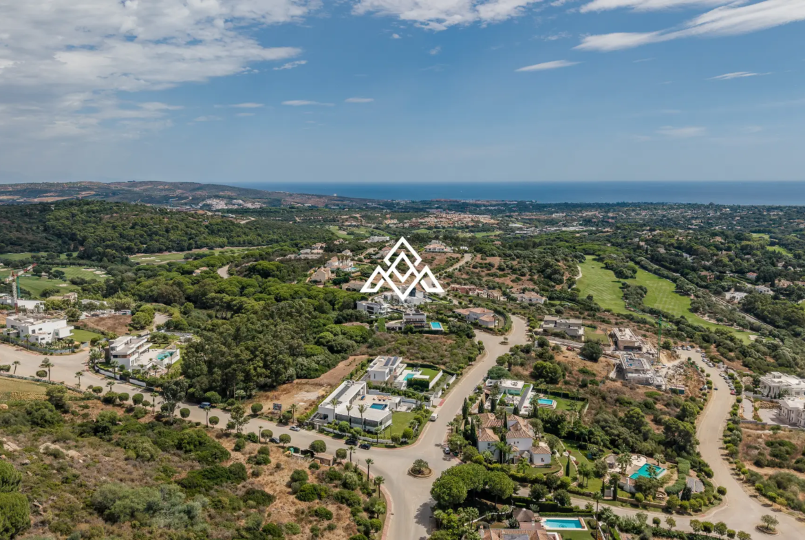 Luxury La Reserva villa for sale in Sotogrande with panoramic sea views and indoor swimming pool.